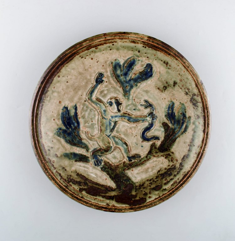 Knud Kyhn for Royal Copenhagen. Large round unique dish with monkey and snake.