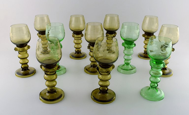 Rømer Glass. Twelve Bohemian wine glasses with engraved grapevines. Czech 
Republic, 1940