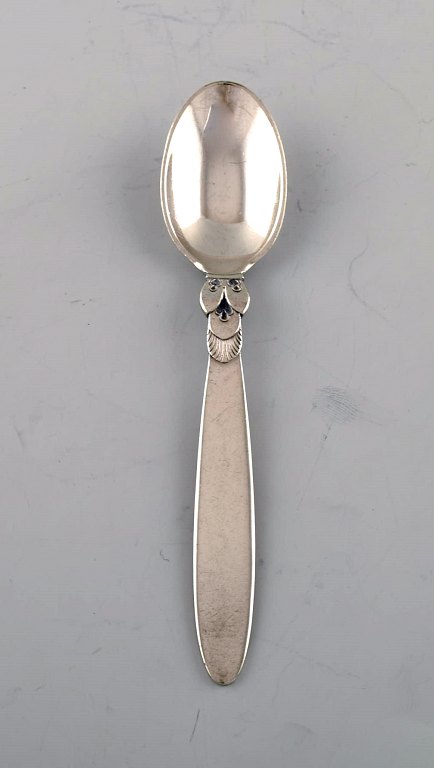Early Georg Jensen "Cactus" coffee spoon in sterling silver. Dated 1915-30. 
Seven pieces in stock.