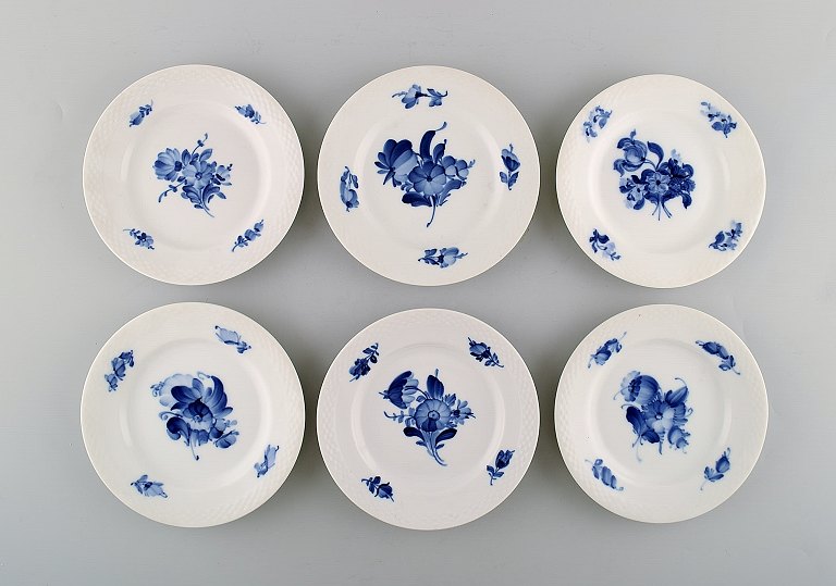 Six blue flower braided cake plates from Royal Copenhagen.
Number 10/8092.