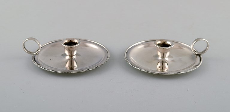 Just Andersen, Denmark. A pair of rare and early chamber candlesticks in 
sterling silver. 1930 / 40