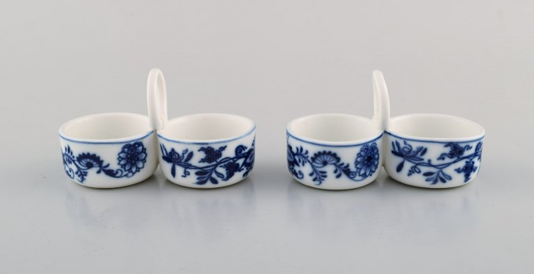 Two antique Meissen "Blue Onion" condiment sets in hand-painted porcelain. Early 
20th century.
