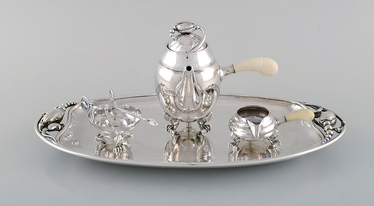 Rare Georg Jensen Blossom mocha set in hammered sterling silver with handles in 
ivory.
