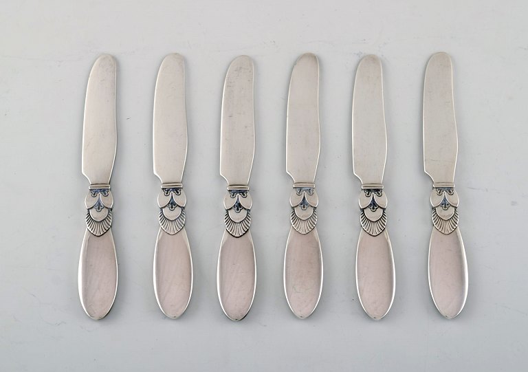 Six Georg Jensen Cactus butter knives in all sterling silver.
