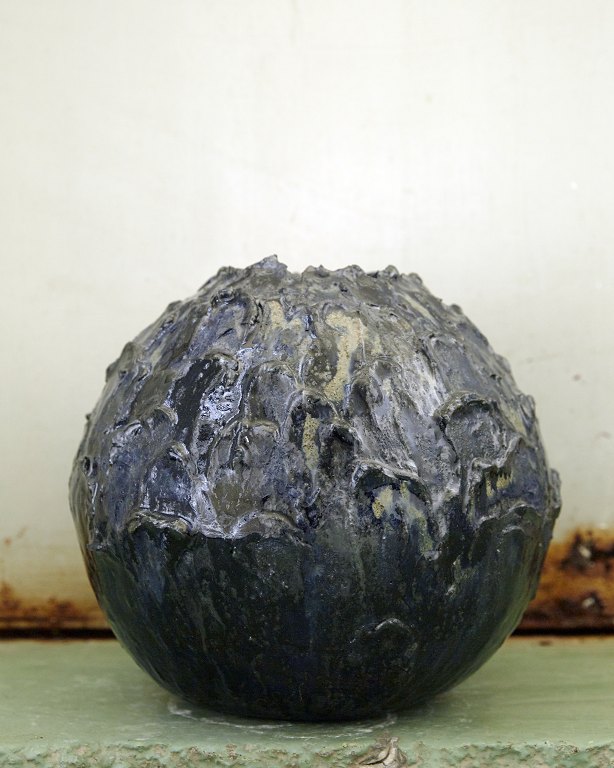 Christina Muff, Danish contemporary ceramicist (b. 1971). Hand modeled stoneware 
vase from the ‘Seed’ series. The vase is decorated with clay and has a 
beautiful, dark blue glaze with splashes of yellow.