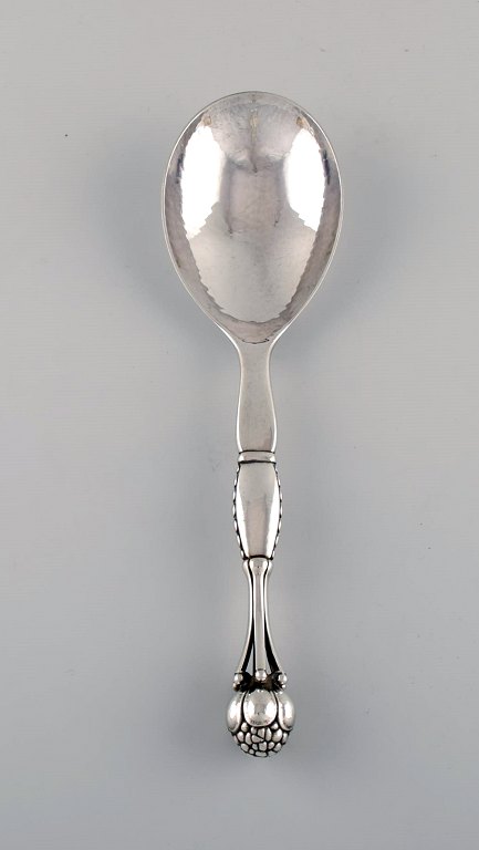 Rare Georg Jensen serving spoon in hammered sterling silver. Designed by Georg 
Jensen in 1912. Design 38.
