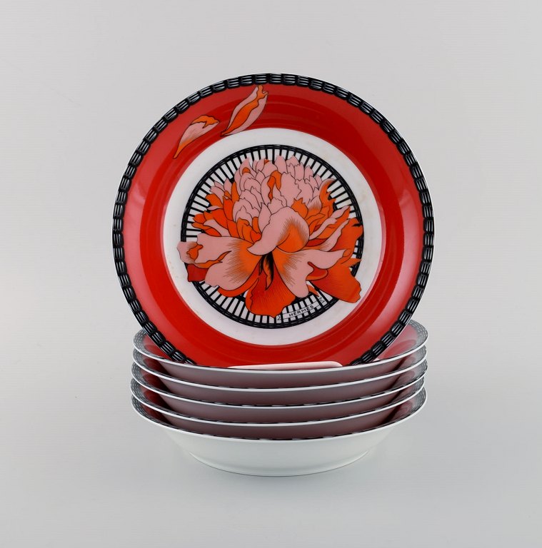Six Hermès porcelain bowls decorated with red flowers. 1980s.

