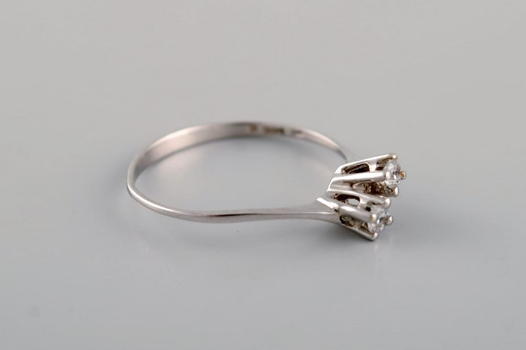 Margit E. Collection, Denmark. Alliance ring in 9 carat white gold adorned with 
cubic zirconias. 21st Century.
