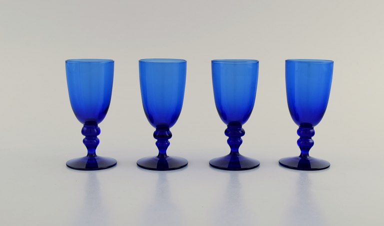 Monica Bratt for Reijmyre. Four shot glasses in blue mouth blown art glass. 
Swedish design, mid 20th century.
