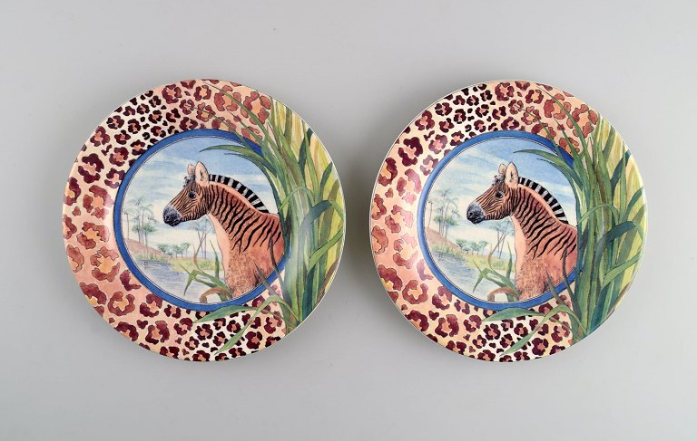 Gien, France. Two Savane porcelain plates with hand-painted zebras. Late 20th 
century.
