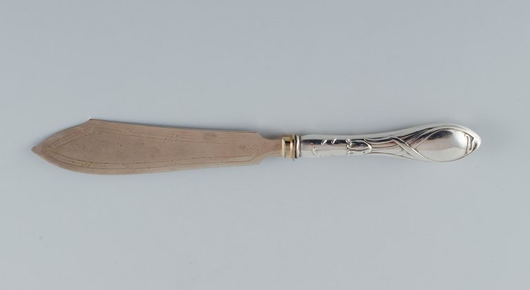 Silver cake knife.
about 1900.