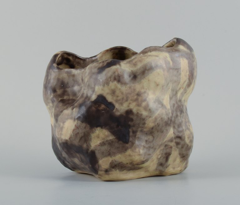 Christina Muff, Danish contemporary ceramicist (b. 1971). 
Unique stoneware vase with cream/black matte glaze. Hand modeled, and 
organically shaped.