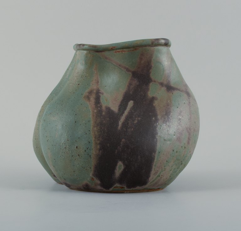 Christina Muff, Danish contemporary ceramicist (b. 1971). 
Unique seedpod vessel made from stoneware clay, with matte blue and brown 
glaze.