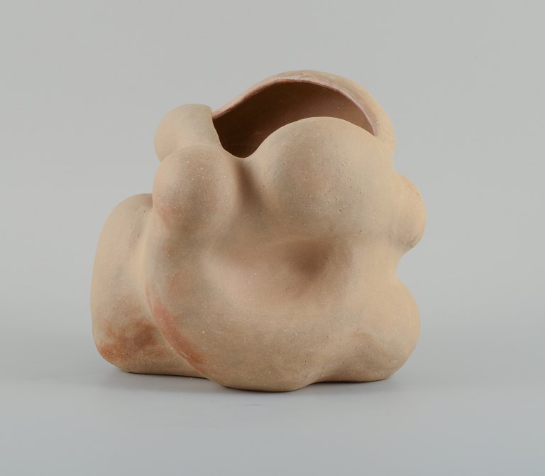 Christina Muff, Danish contemporary ceramicist (b. 1971). 
Unique organically shaped vase in light golden stoneware clay. Clear glaze on 
the inside.