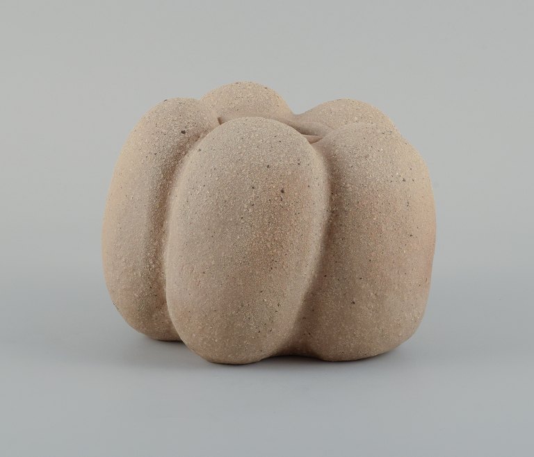 Christina Muff, Danish contemporary ceramicist (b. 1971). 
Small, unique stoneware seedpod vase. Unglazed, with specks the vessel is 
organically shaped.