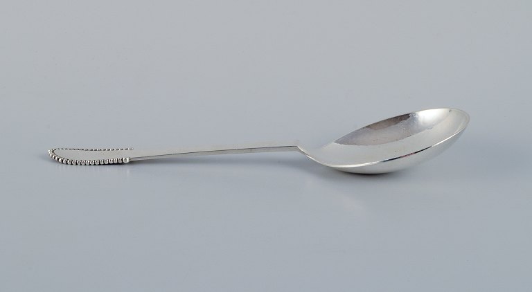 Georg Jensen Beaded.
Serving spoon in sterling silver.