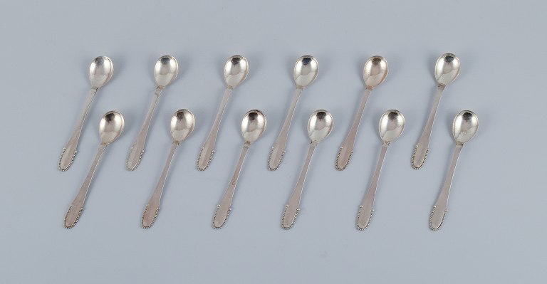 Georg Jensen Beaded.
A set of twelve coffee spoons in sterling silver.