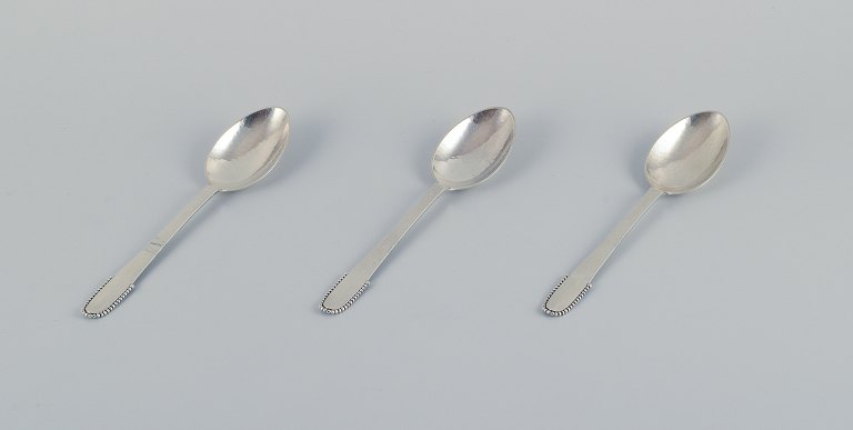 Georg Jensen Beaded.
Three dinner spoons in sterling silver.