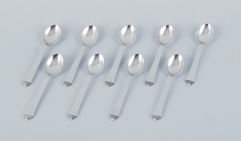 Georg Jensen Pyramide, a set of nine coffee spoons in sterling silver.