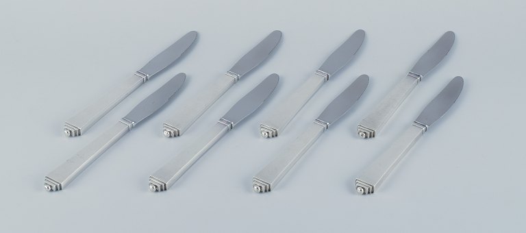 Georg Jensen Pyramid, a set of eight long-handled dinner knives in sterling 
silver and steel.