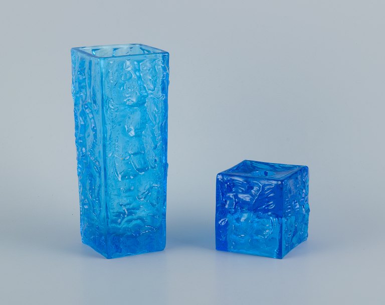 Gullaskruf, Sweden, square-shaped glass vase and candlestick in blue art glass.