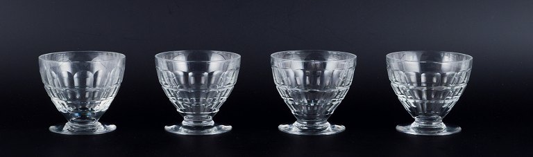 Baccarat, France, a set of four "Charmes" Art Deco red wine glasses in clear 
crystal glass. Faceted cut.