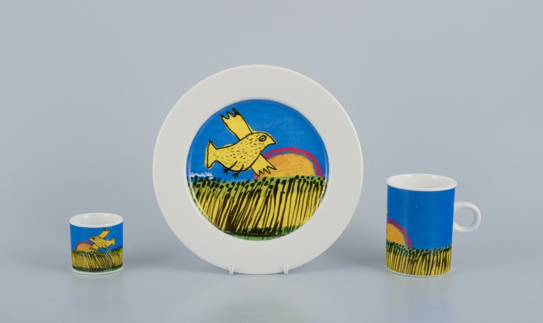 Corneille (Guillaume Cornelis van Beverloo), Dutch CoBrA artist (1922-2010). 
Coffee cup, plate, and egg cup in porcelain decorated with birds over a field 
with sunrise.