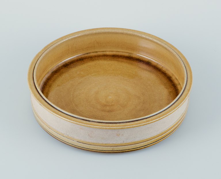 Nils Kähler for Kähler. Large ceramic bowl in modernist design.
Uranium yellow glaze.