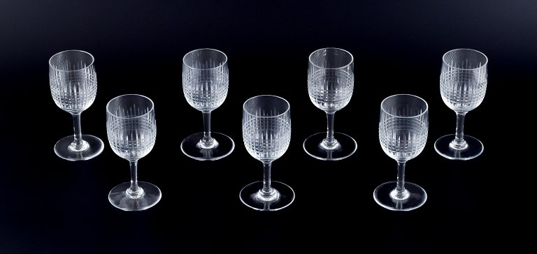 Baccarat, France. A set of seven "Nancy" red wine glasses in clear crystal 
glass.