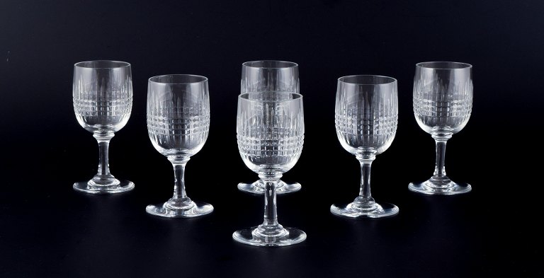 Baccarat, France. A set of six "Nancy" white wine glasses in clear crystal 
glass.
