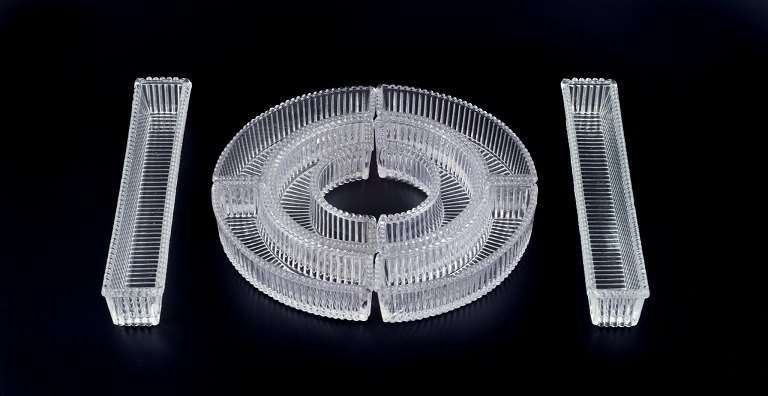 Baccarat, France, "Surtout de Table" consisting of eight crystal glass pieces in 
a ribbed Art Deco design.