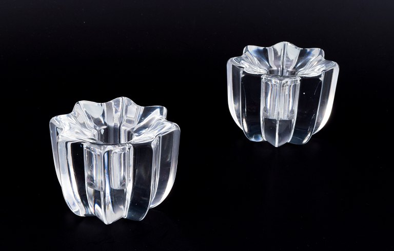 Sven Palmqvist for Orrefors, Sweden. A pair of low art glass candle holders in 
crystal glass.