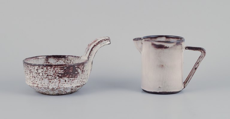 Gerard Hofmann (1917-1965), French ceramicist, own workshop. Two unique ceramic 
pieces: a pitcher and a handled bowl. Earth-toned glaze.