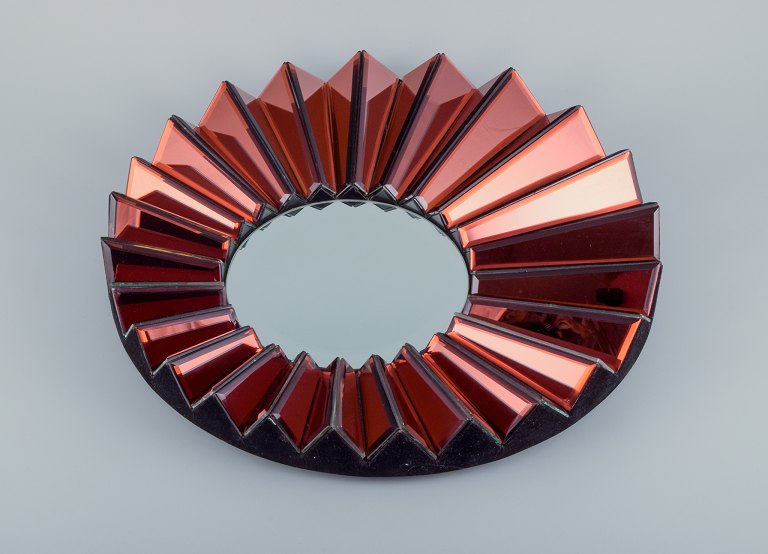 Olivier de Schrijver (1958), French designer. Futuristic "Simba Rouge" unique 
wall mirror made of copper-colored metallic acrylic glass. Faceted mirror.