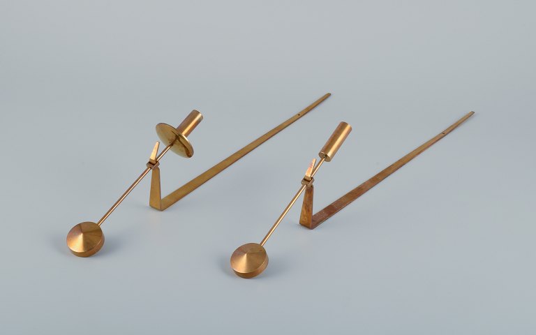 Skultuna, Sweden. A pair of "Lampett Pendel" wall-mounted candle sconces in 
brass.