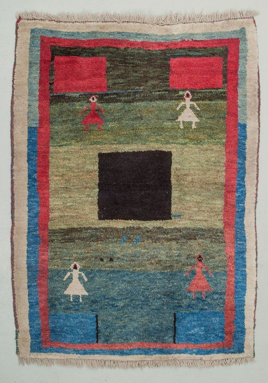 Swedish textile designer. Carpet in pure wool. Handwoven.
Designed with figures and geometric fields in various colors.