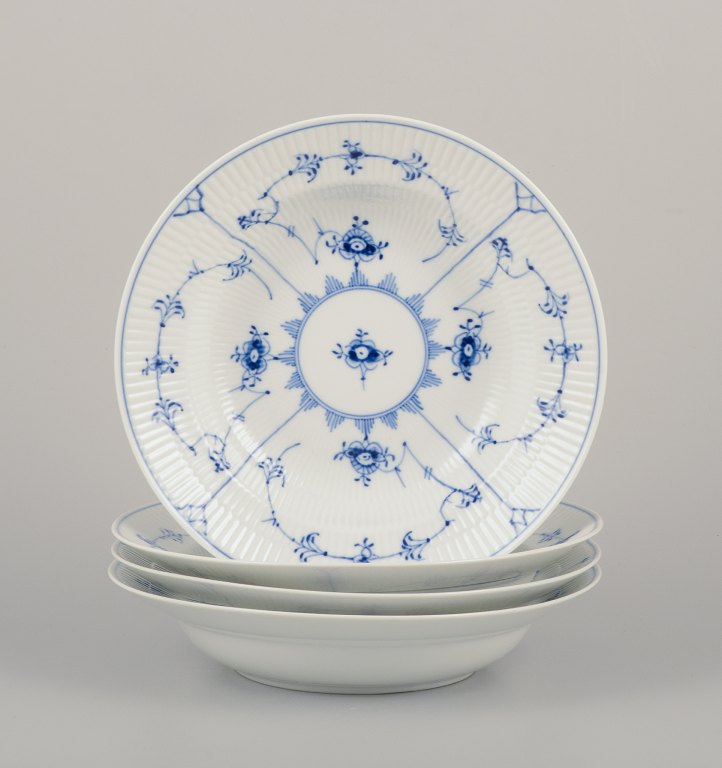 Royal Copenhagen Blue Fluted Plain. A set of four deep plates in porcelain.