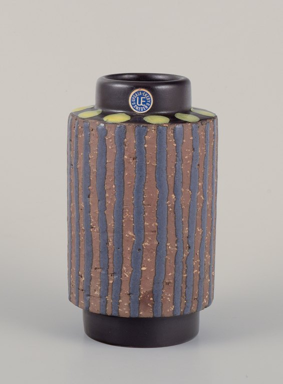 Mari Simmulson (1911-2000) for Upsala Ekeby. A ceramic vase with blue lines and 
yellow dots.