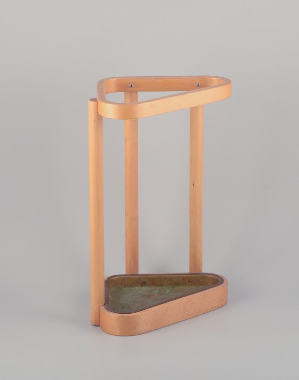 Alvar Aalto for Artek, Finland. Umbrella stand in birch and brass.