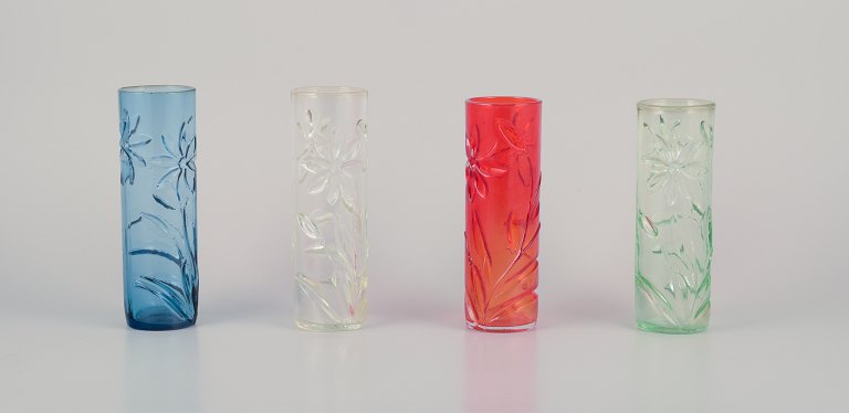 Fåglavik, Sweden. A set of four art glass vases with flower motifs. Handmade and 
in various colors.