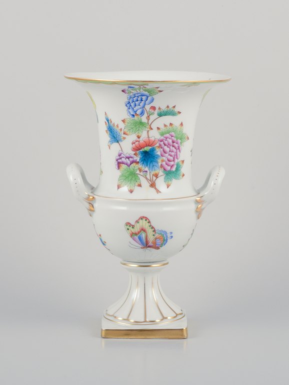 Herend, Hungary. Large porcelain vase with handles. Hand-painted with flower 
motifs and butterflies.