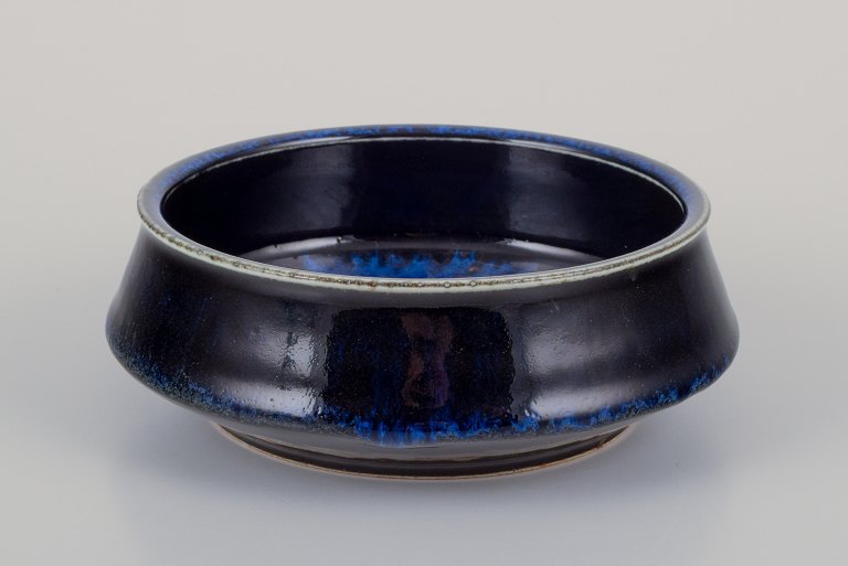 Carl Harry Stålhane for Rörstrand. Ceramic bowl with blue tones glaze.