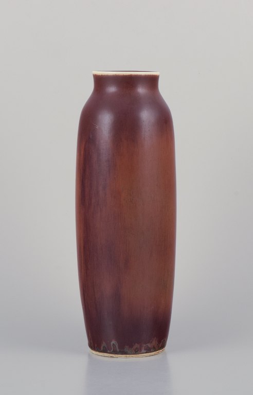 Carl Harry Stålhane (1920-1990) for Rörstrand. Large ceramic vase with glaze in 
shades of brown.