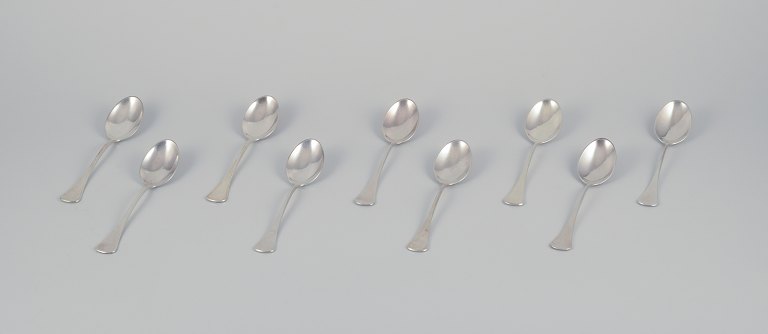 Horsens Silver. A set of nine dining spoons in 830 silver.