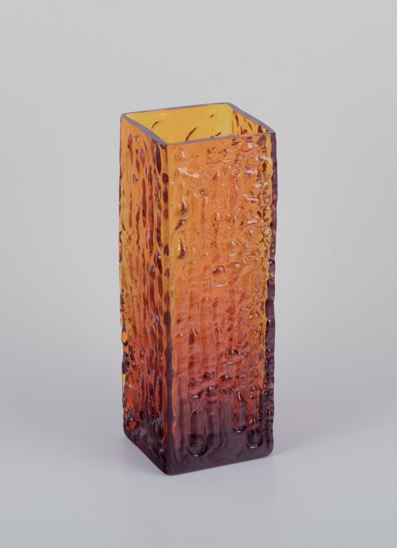 Scandinavian glass artist. Large art glass vase in amber-colored glass.