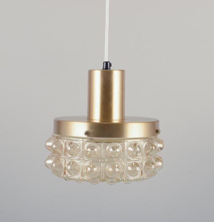 Helena Tynell, Finnish glass artist, for Limburg.
Designer ceiling lamp in clear glass and metal.