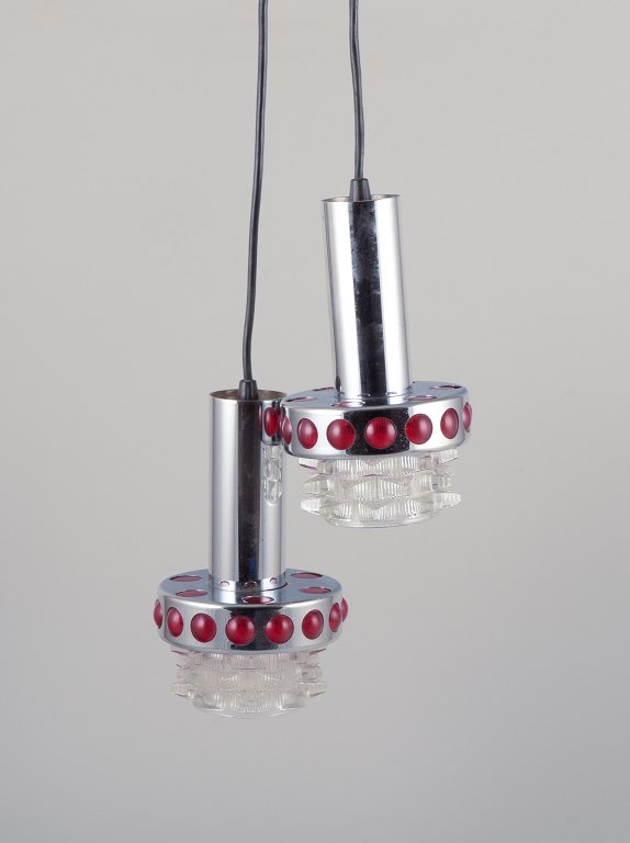 Raak, Holland. Two ceiling pendants in chromed metal and art glass.