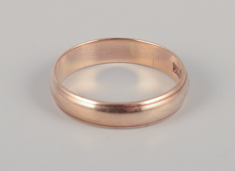 Danish goldsmith. 14 karat gold alliance ring. Classic and minimalist design.