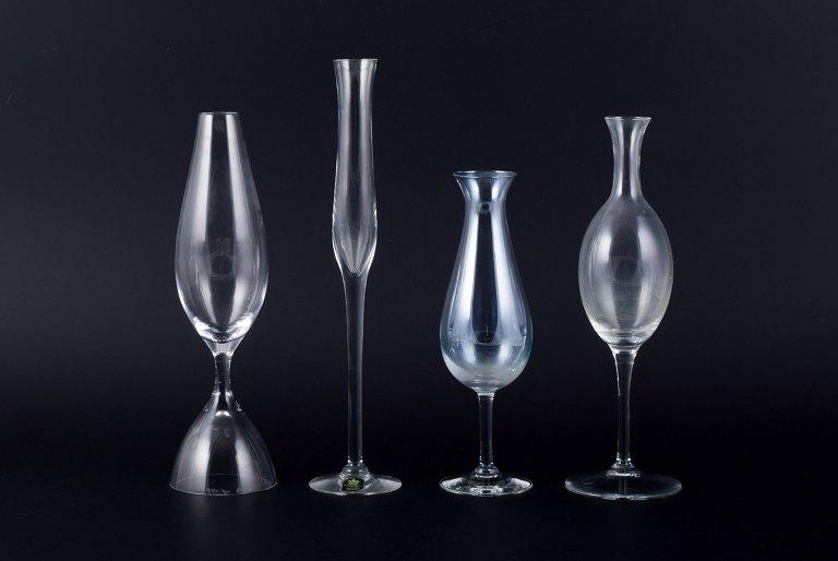 Kosta Boda and several other Swedish glassworks. Set of four tall mouth-blown 
glasses.