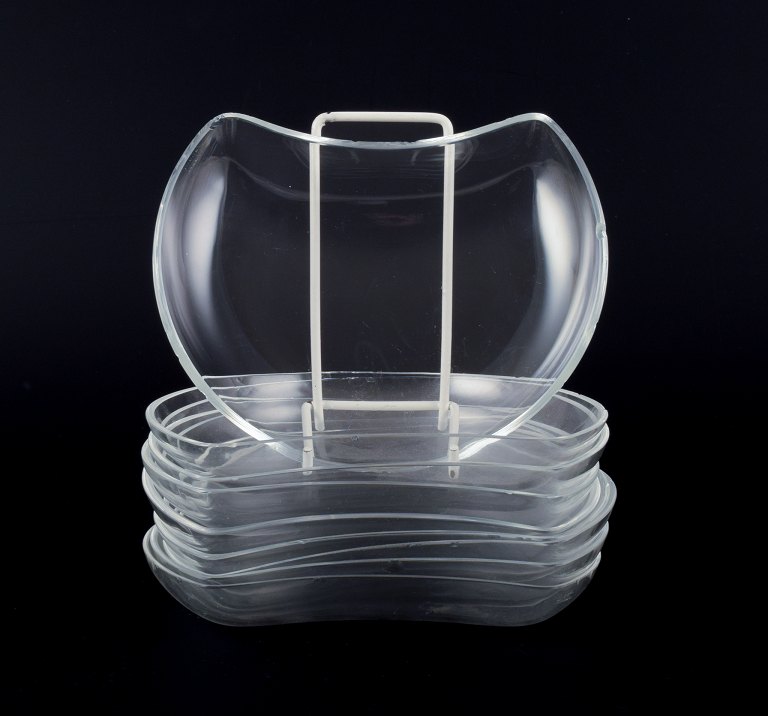 René Lalique, France. A set of nine glass plates.